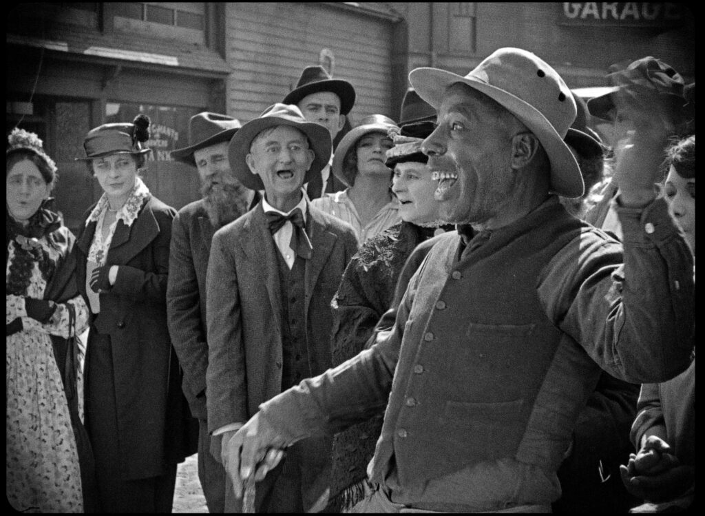 George Reed in scene from ONE A MINUTE (1921)