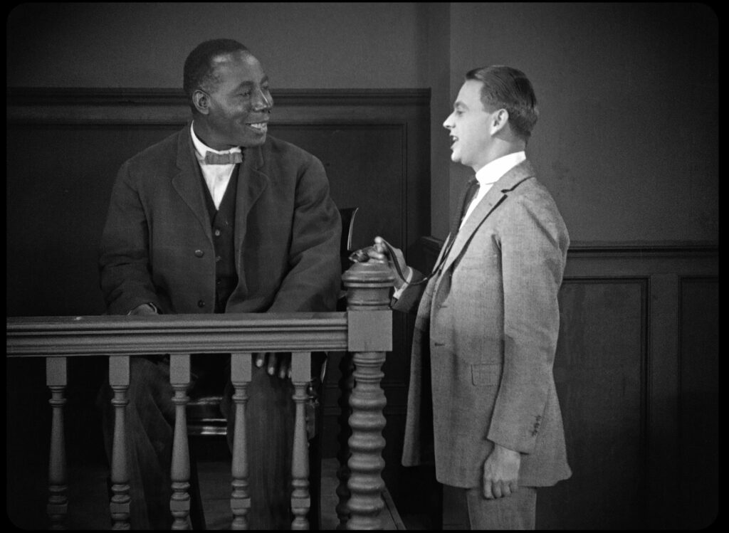 George Reed in scene from ONE A MINUTE (1921)